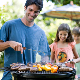 Fenteer BBQ Meat Turner Hook with grilling action for steady flips.