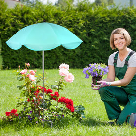 Feoang canopy shade for garden beds and vegetables in the yard.