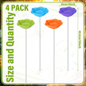 Colorful resin bee watering stations stand out while offering a safe drinking spot.
