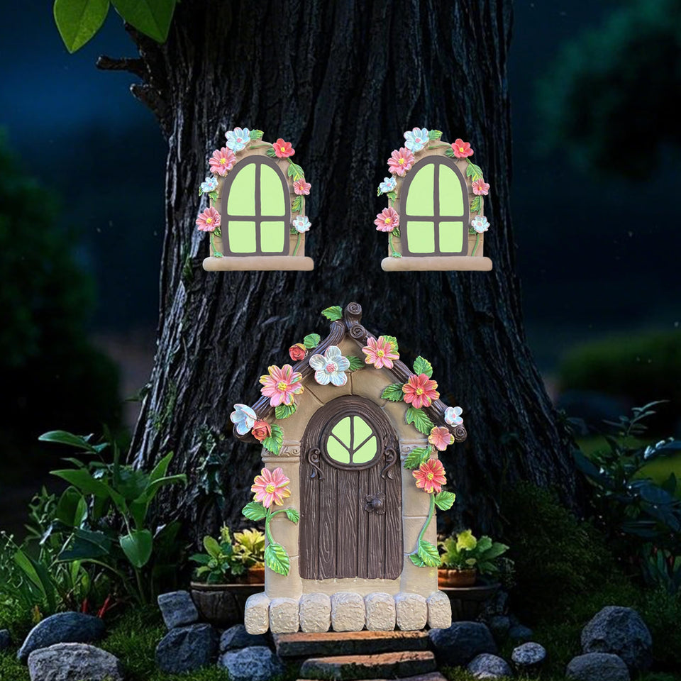 FESTGLOX fairy door on a tree trunk glows softly at night, guiding pixies home.