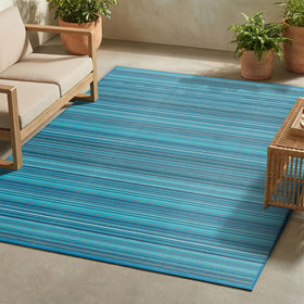 FH Home Outdoor Camping Rug Havana Turquoise foldable for easy RV storage.
