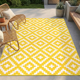 FH Home outdoor rug with aztec yellow and white pattern, waterproof and patio-ready.