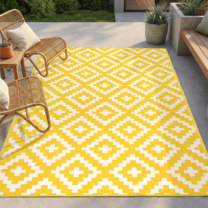 FH Home outdoor rug with aztec yellow and white pattern, waterproof and patio-ready.