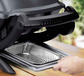 Fig & Leaf Genesis drip pan prevents overflow during grilling.