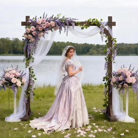 Fikowo wooden arch decorated with flowers creates an elegant wedding backdrop.