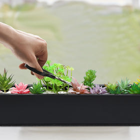 FillTouch modern metal planter on table illustrating minimalist home decor.
