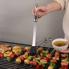 FIRBISI oil brush for even seasoning and mess-free basting.
