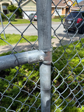 Firofend T rail clamp in use for secure fence top rail.