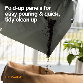 Fiskars Planting Mat with easy-carry strap handles for transport