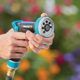 Fiskars swivel design helps reach around obstacles while watering.