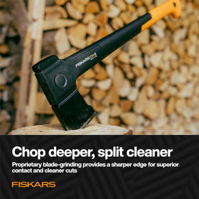 Fiskars X24 during chopping action in resinous wood demo