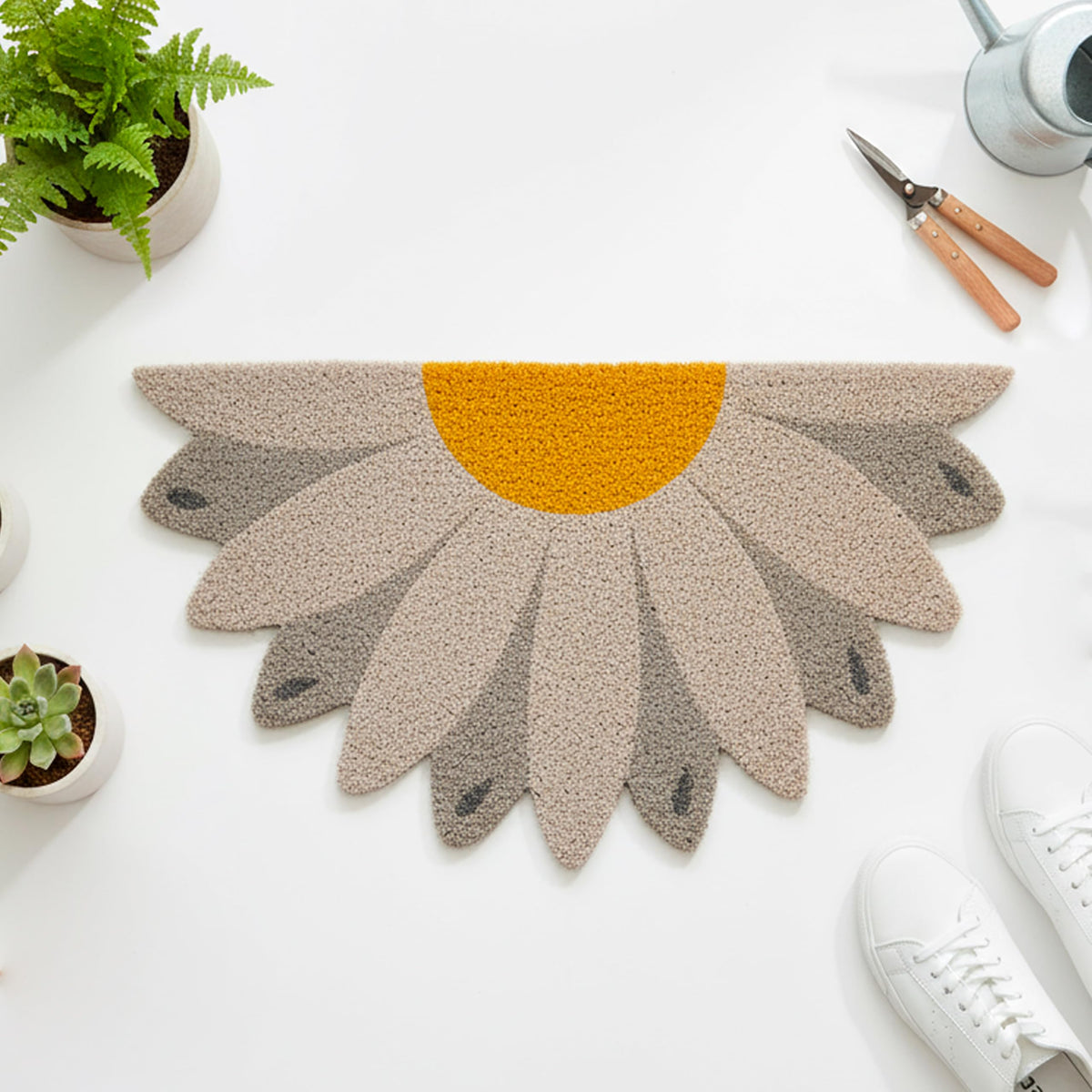 Fisura Daisy hand-painted mat adds colorful curb appeal to front door.