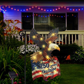 Flagmesage solar LED flag night glow highlighting patriotic design.