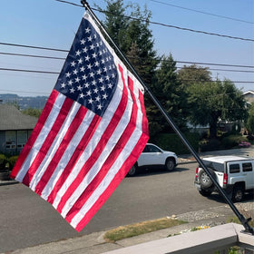Flagolden heavy-duty flag with brass grommets provides secure boat mounting.