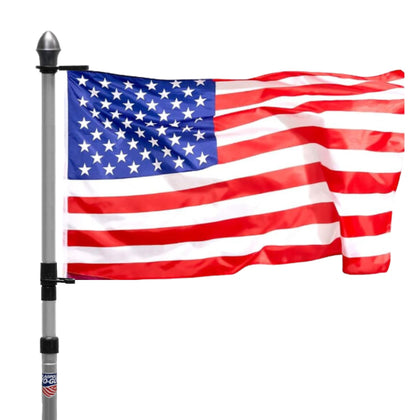 Flagpole-To-Go portable flagpole extended to full height for outdoor displays.