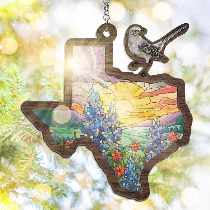 FLAGWIX mockingbird-bluebonnet suncatcher catching sunlight through a window