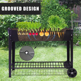 Fleecy day galvanized steel planter with water system for even moisture distribution.