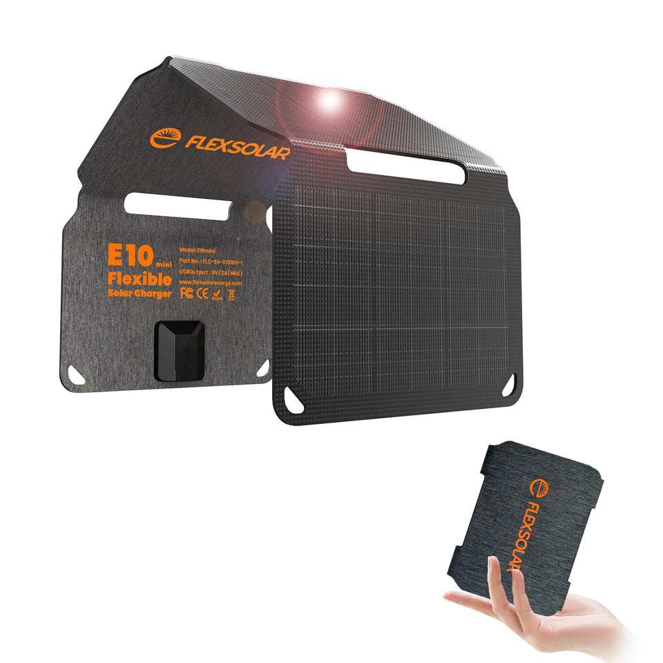 FlexSolar 10W foldable charger panel open in sunlight powering a phone