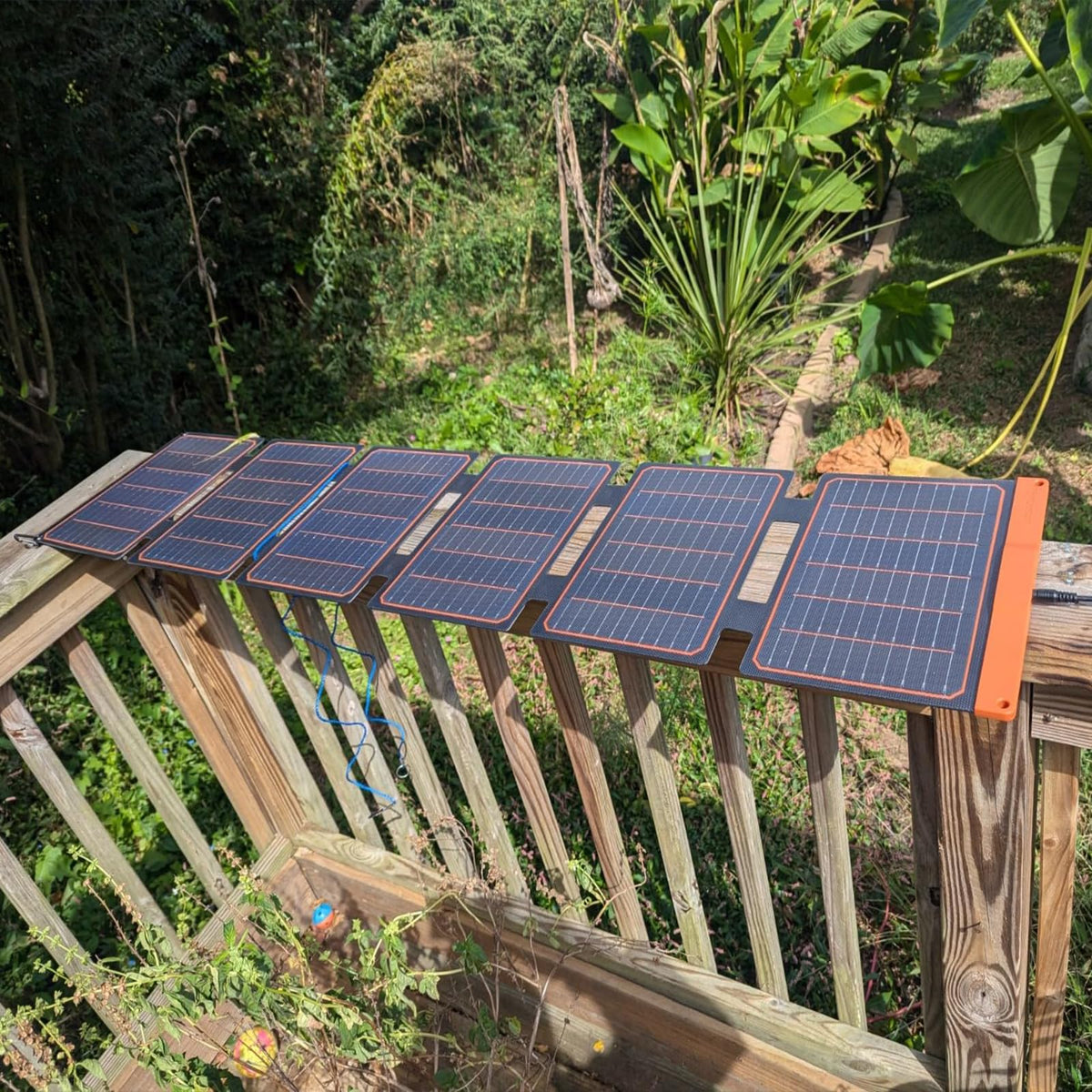 FlexSolar 60W Foldable Panel lightweight design for backpack portability.