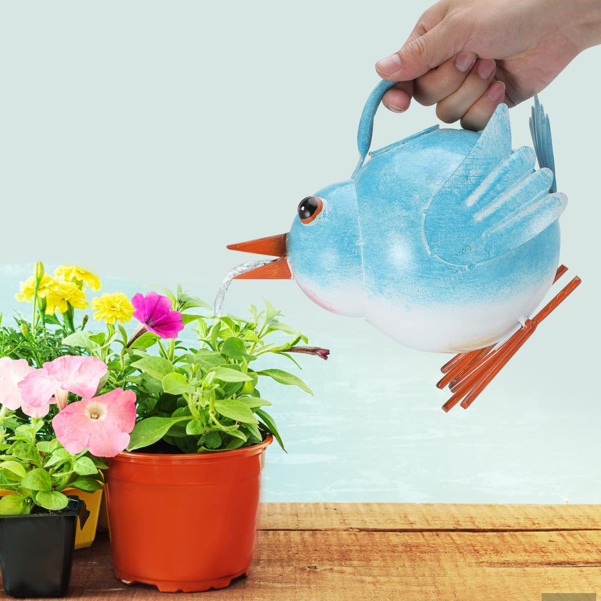 FLHJYF Gift-ready watering can delights kids and gardening enthusiasts.