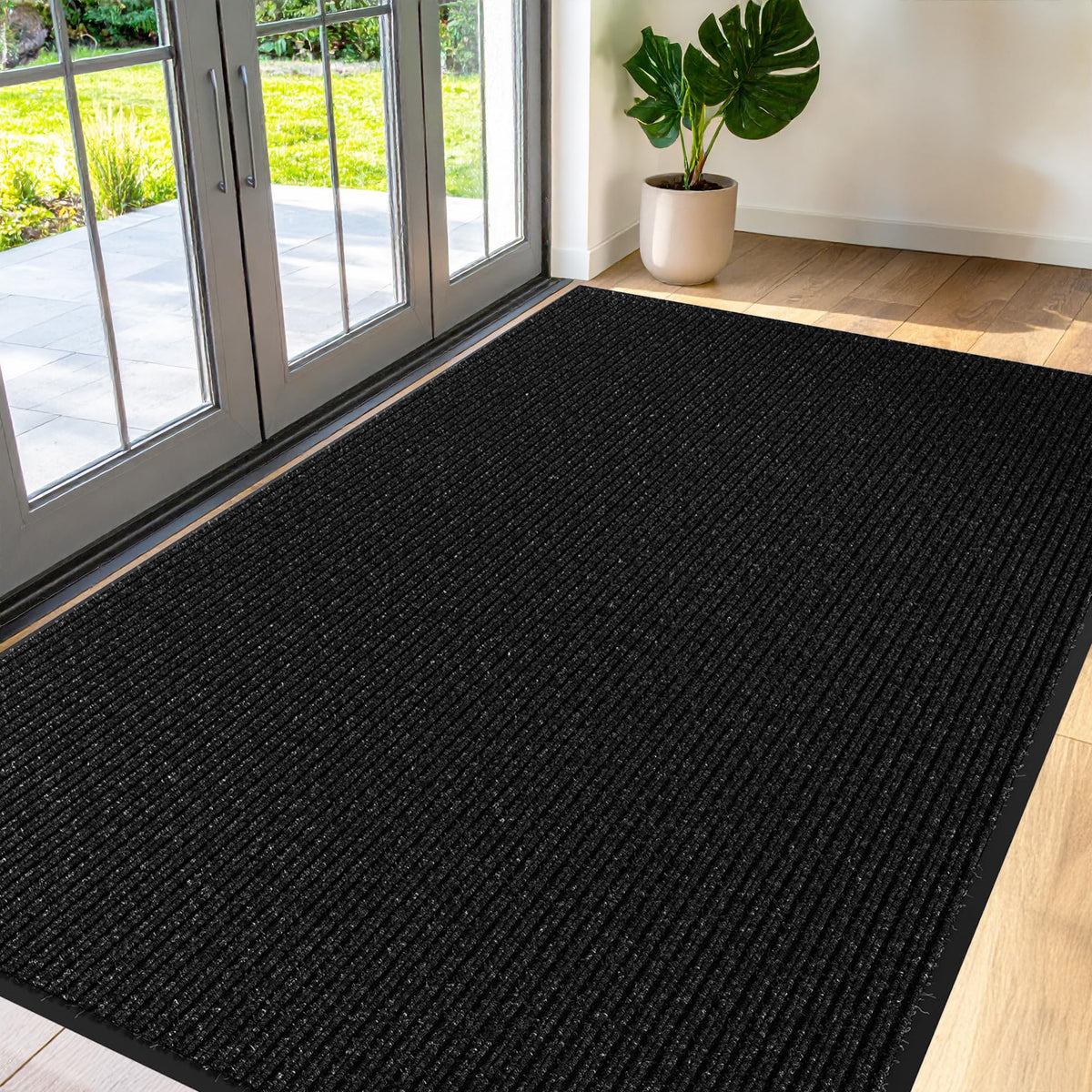 FloorGuard commercial door mat front view, large black entry rug that traps dirt