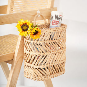 Daily mail organizer using Floramill hanging basket beside an entryway.
