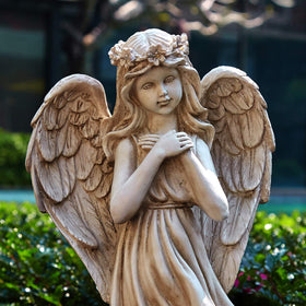 Floryden grave site angel statue offers a respectful sympathy accent.