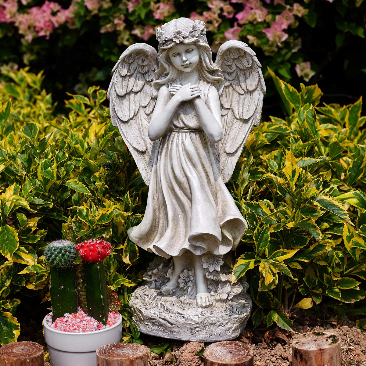 Floryden solar-led angel night illumination enhances patio ambiance.