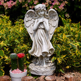 Floryden solar-led angel night illumination enhances patio ambiance.