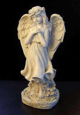 Floryden weatherproof angel statue withstands outdoor conditions.