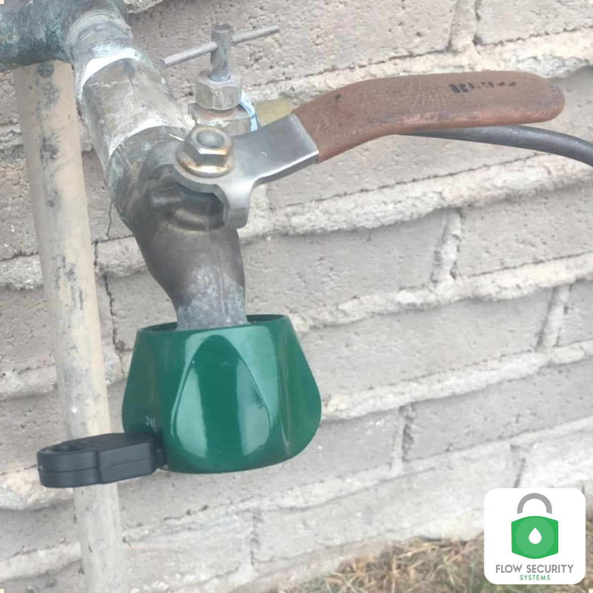Outdoor security with Faucet Lock II protecting a garden faucet