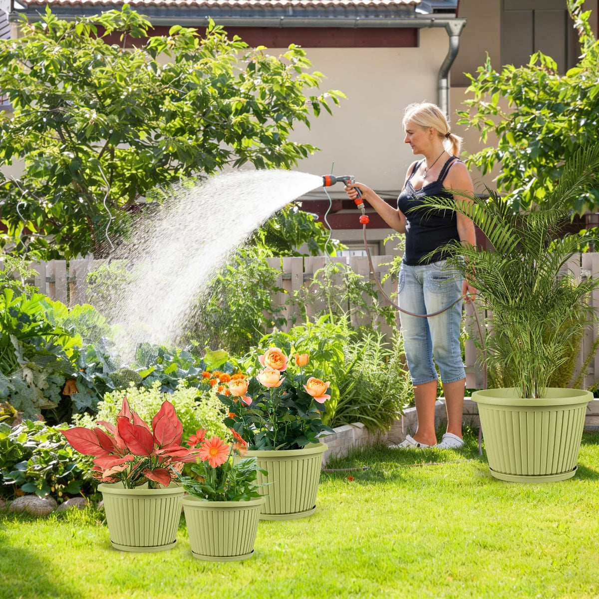 Flowyypo avocado green ribbed planter with saucer protects floors from drips.