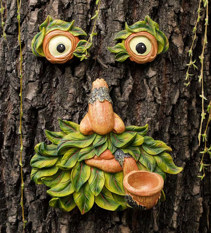 Flytime Tree Face Garden Decor adds whimsy to your outdoor space.