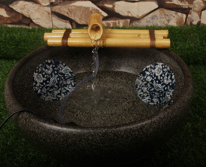 Foci Cozi bamboo water fountain with three-arm spouts for serene zen ambiance.
