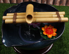 Handcrafted bamboo spouts with eco-friendly coating resist mold on water.