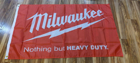 Easy hanging on walls, doors, or fences with Milwaukee banner