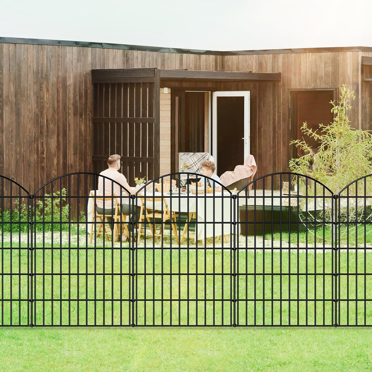 FOREHOGAR black outdoor fence blending with patio and garden