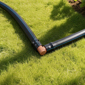 FoxRose leak-proof drip elbow creates reliable corners in garden irrigation.