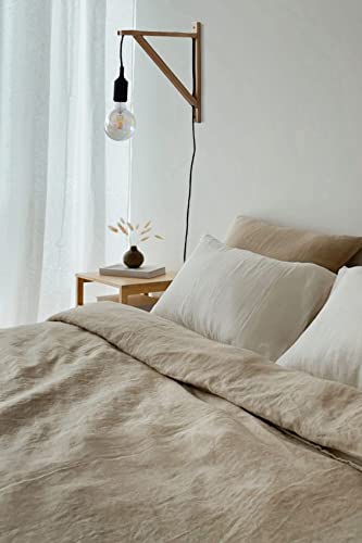 FRIADE Priade wall bracket in burlywood supports a sconce and floating shelf.