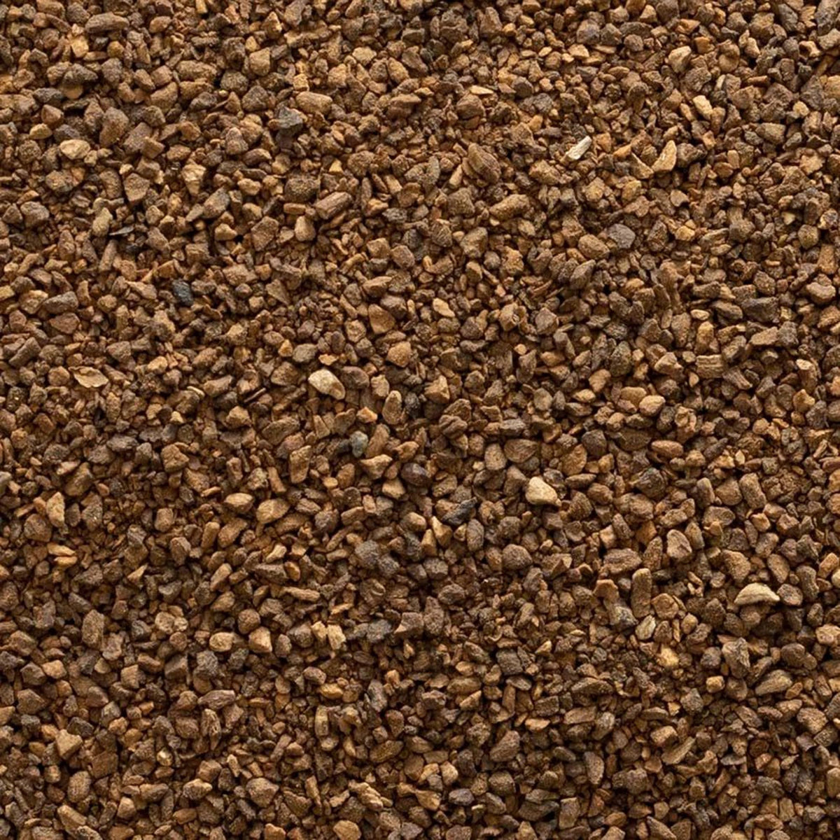 Frontier Co-op roasted dandelion root granules steeping into tea, offering earthy notes.