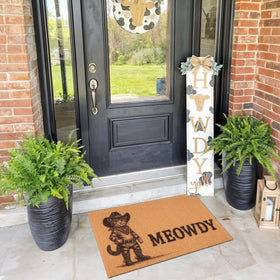 Fttoyoly Cowboy porch decor welcomes guests and traps debris before entering.