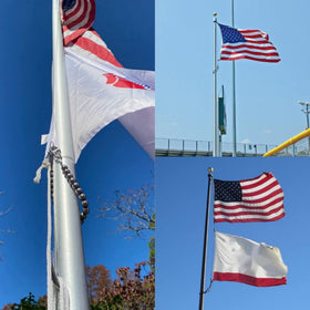 FUNNANS beaded ring demonstrates stability in breezy conditions on the flagpole.