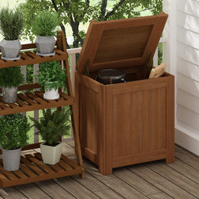 Tioman storage box lid-open reveals interior space for cushions and tools.