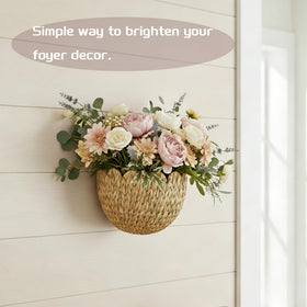 Furrywise wall planter basket showcases small plants with a warm, organic texture.