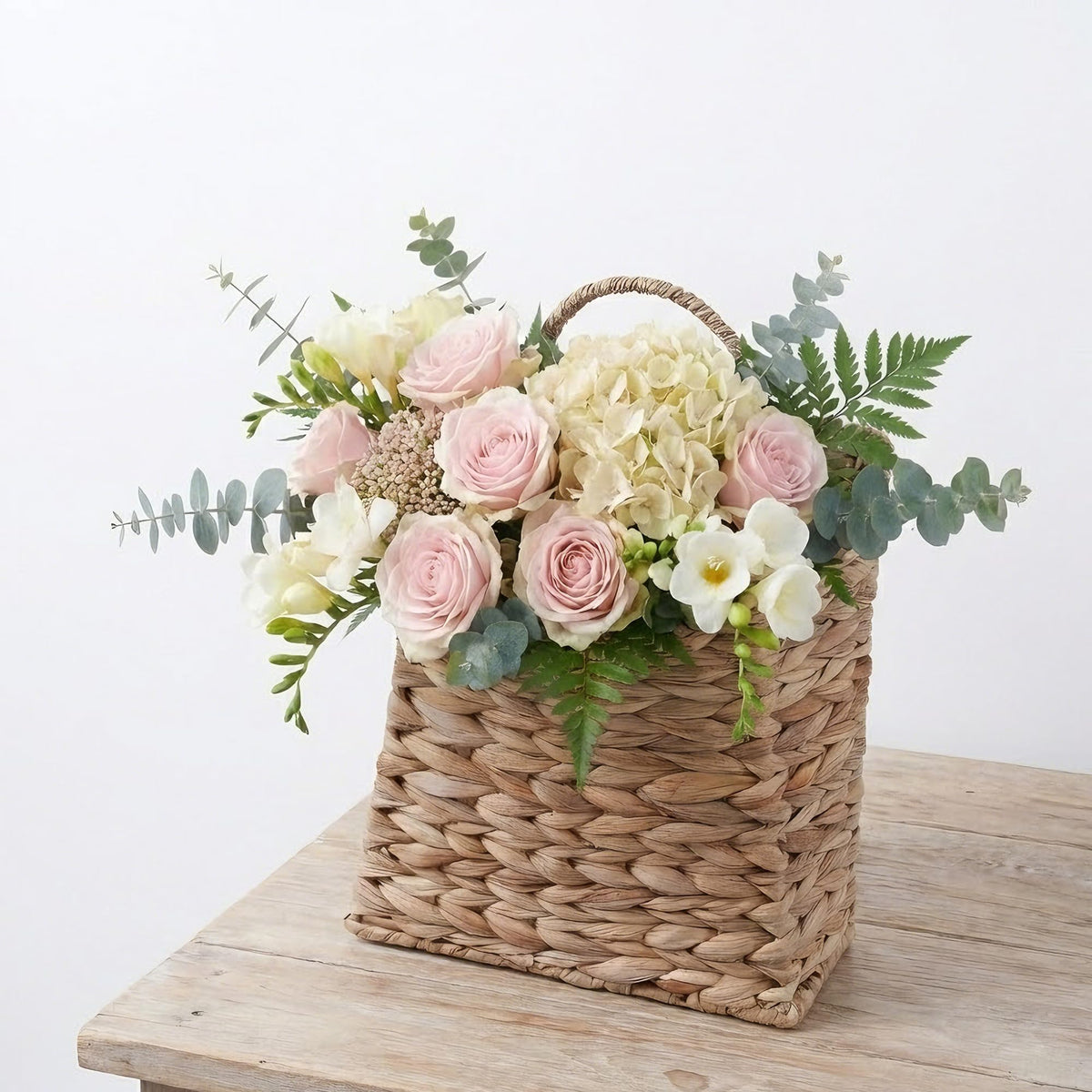 Furrywise Water Hyacinth hanging basket used as a small storage or mail organizer.