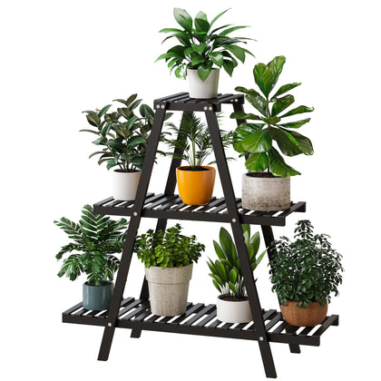 Furshus bamboo plant stand in black, three-tier indoor display for eight pots.