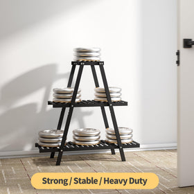 Lightweight and easy to move Furshus plant stand in a living room.