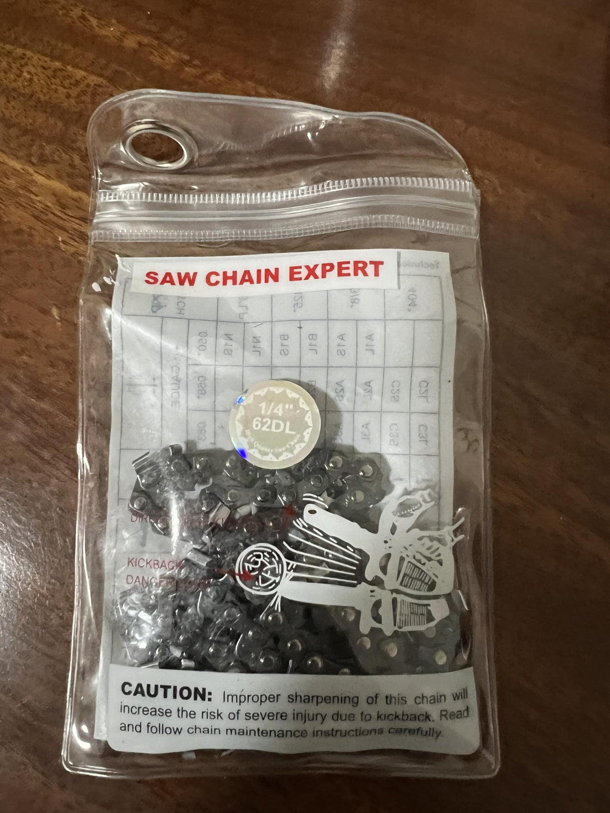 FXAFXA 12-inch replacement chain closeup in durable steel finish enhances cutting reliability.