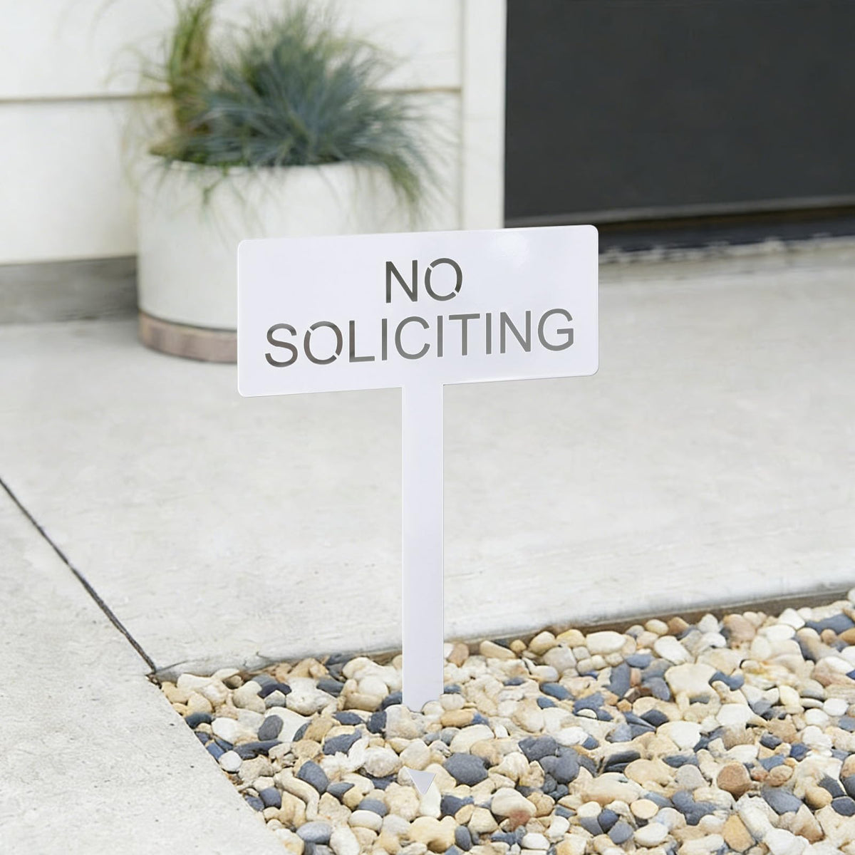 Fynleka White finish sign enhances curb appeal in residential spaces.