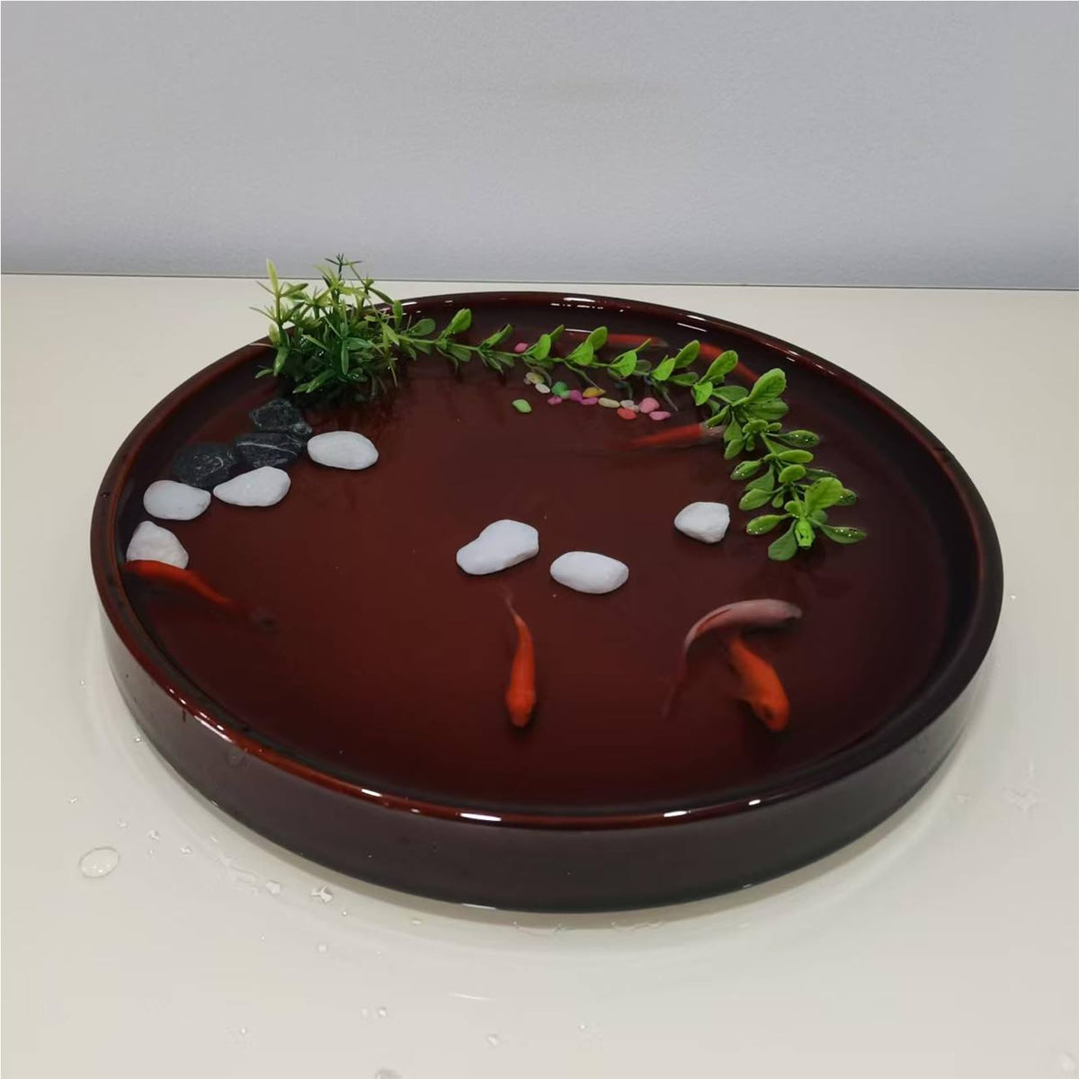 Fzfeiyy round plant tray suitable for indoor and outdoor placement.